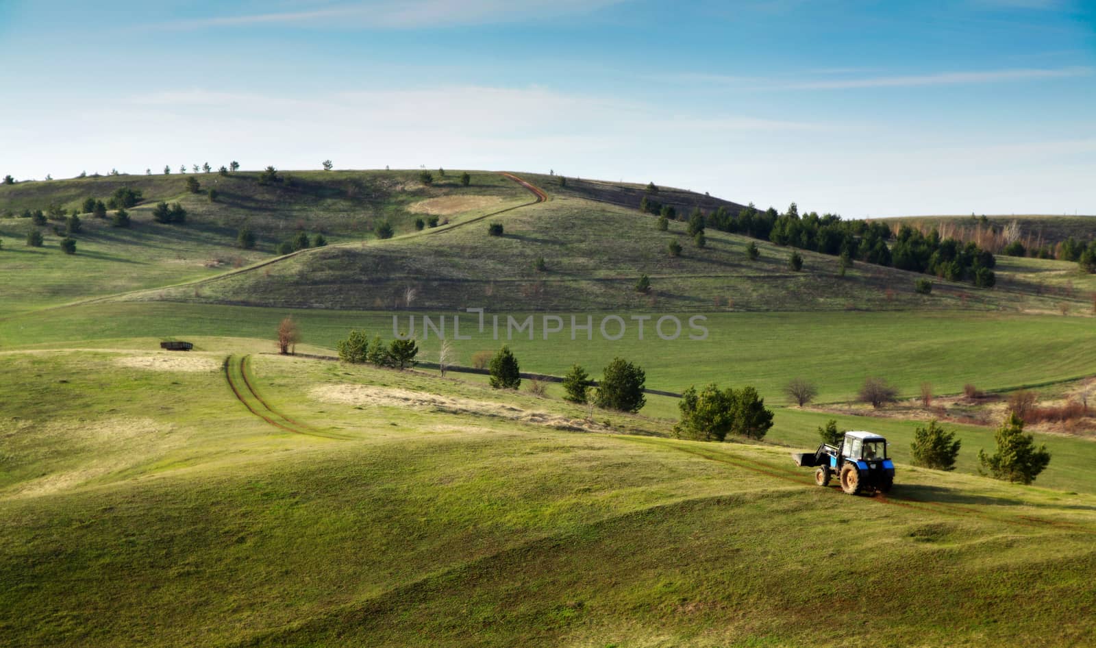 Beautiful summer landscape with green hills and blue sky.