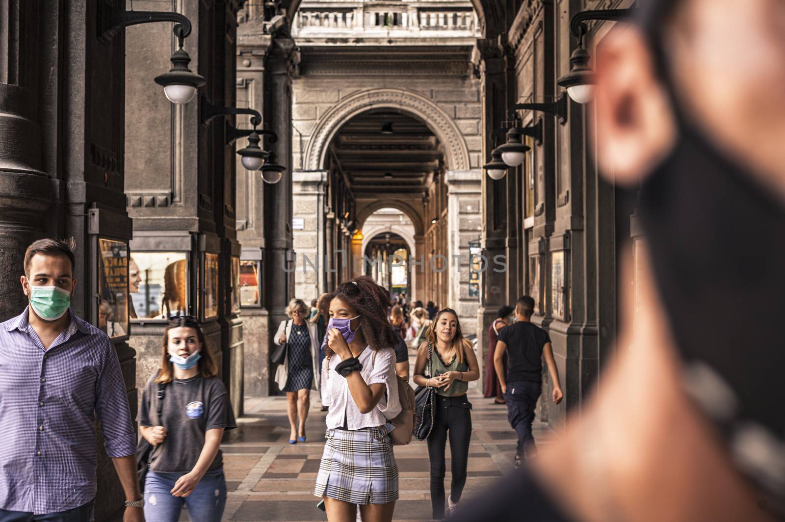 People walking under Bologna's Arcades in Italy 3 by pippocarlot