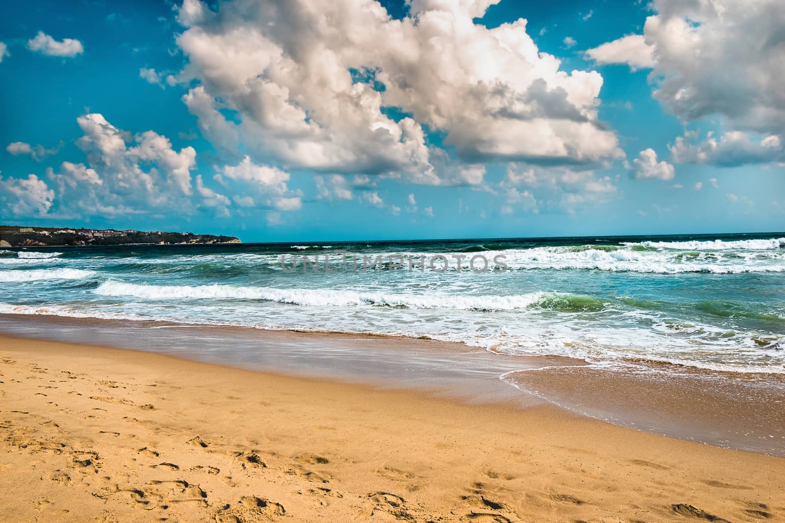 Seascape cloudy scene. Tropical  scenery with sand, wave of sea or ocean. calm paradise, relaxation, with splash of water and blue sky landscape, Amazing dramatic nature background of beach and sea 