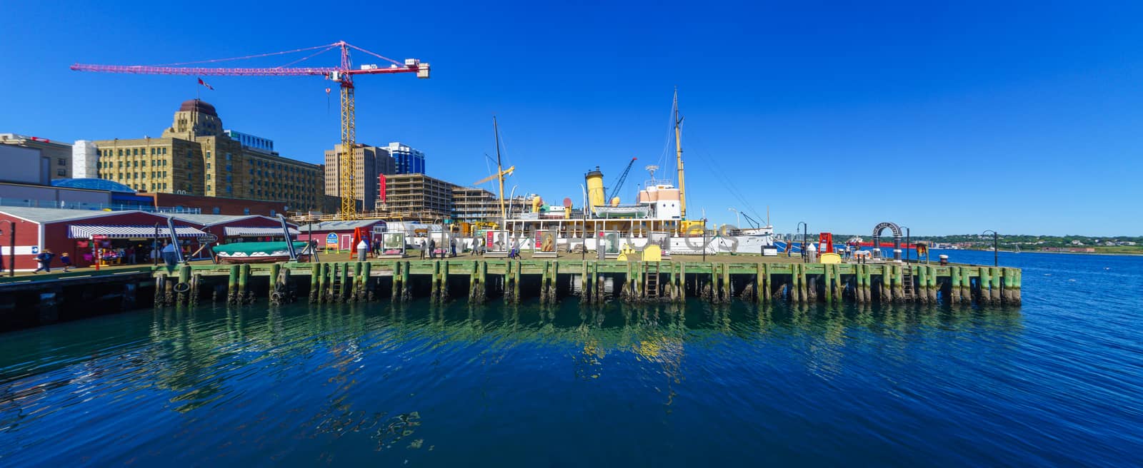 Halifax, Canada - September 23, 2018: Panoramic view of the harbor and the downtown, with locals and visitors, in Halifax, Nova Scotia, Canada