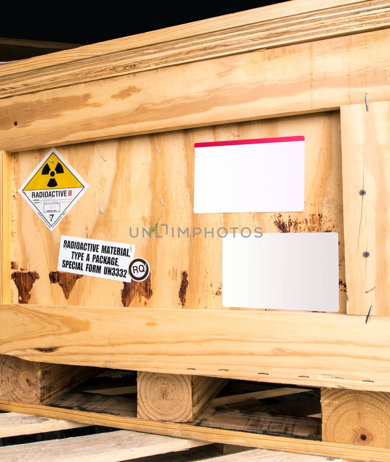 Radiation label beside the transport wooden box Type A package by Satakorn