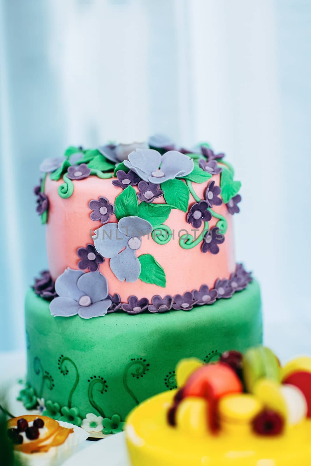 Celebratory cake with flowers with mastic. Candy bar birthday by Opikanets