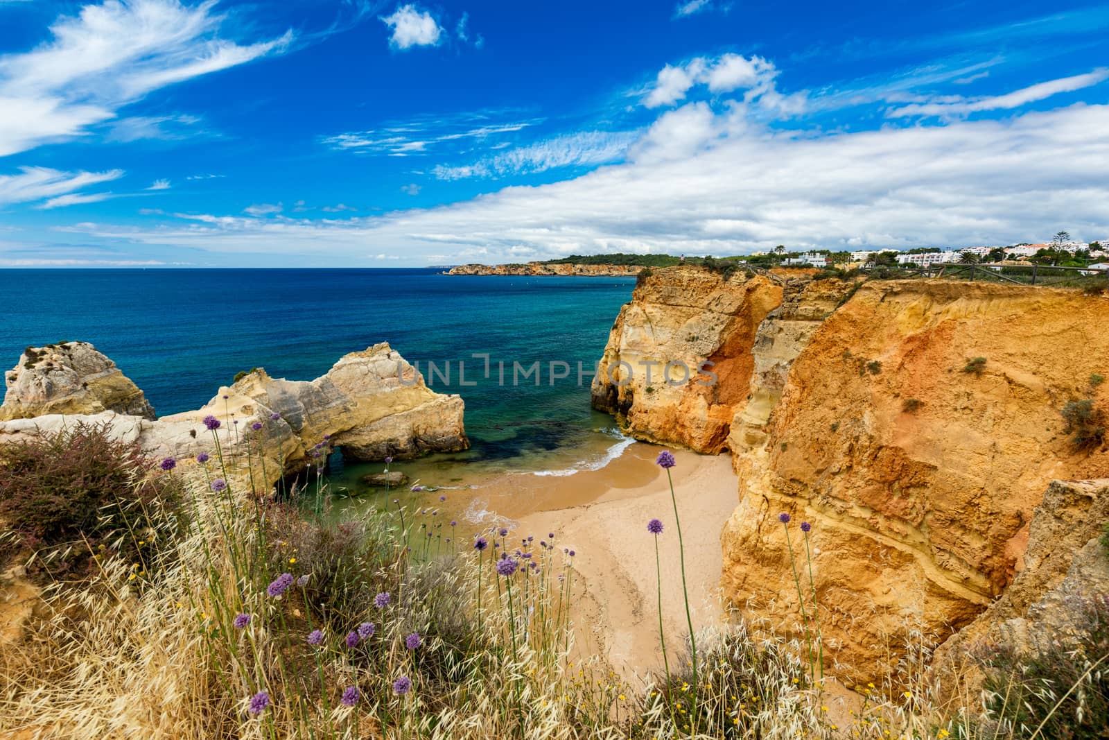 Careanos Beach (Praia dos Careanos) in Portimao, Algarve, Portugal. Concept for travel in Portugal and summer vacations in Portimao, Algarve, Portugal. 