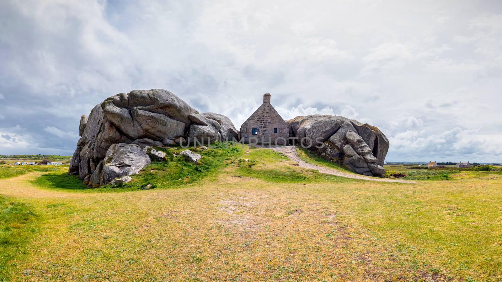 House between the rocks in Meneham village, Kerlouan, Finistere, Brittany (Bretagne), France