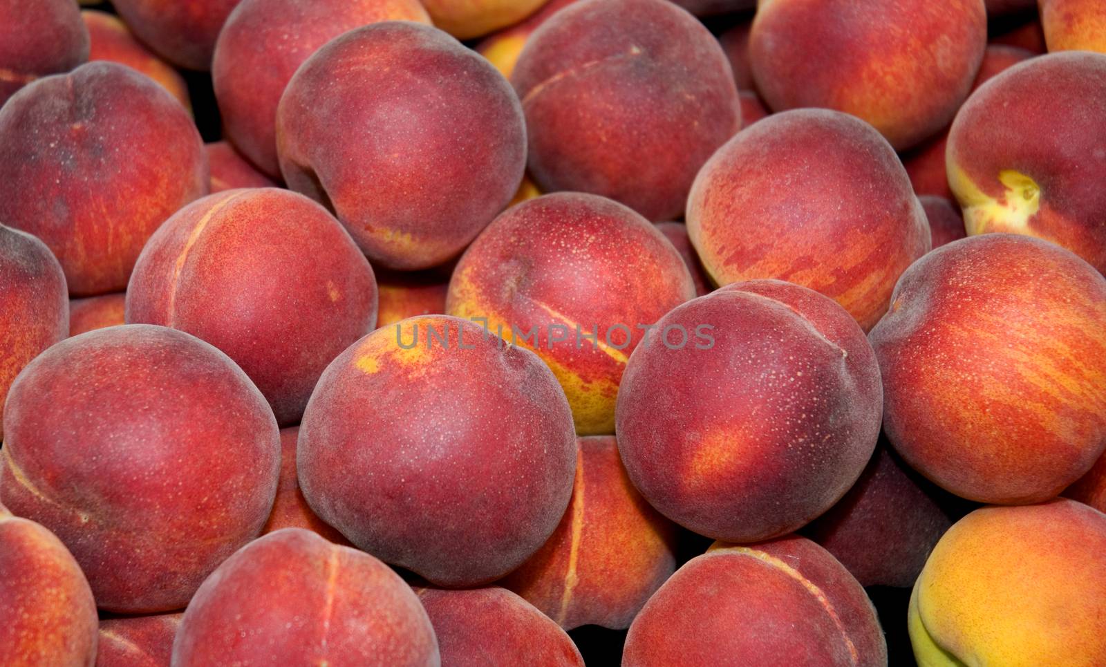 A tray of fresh peaches