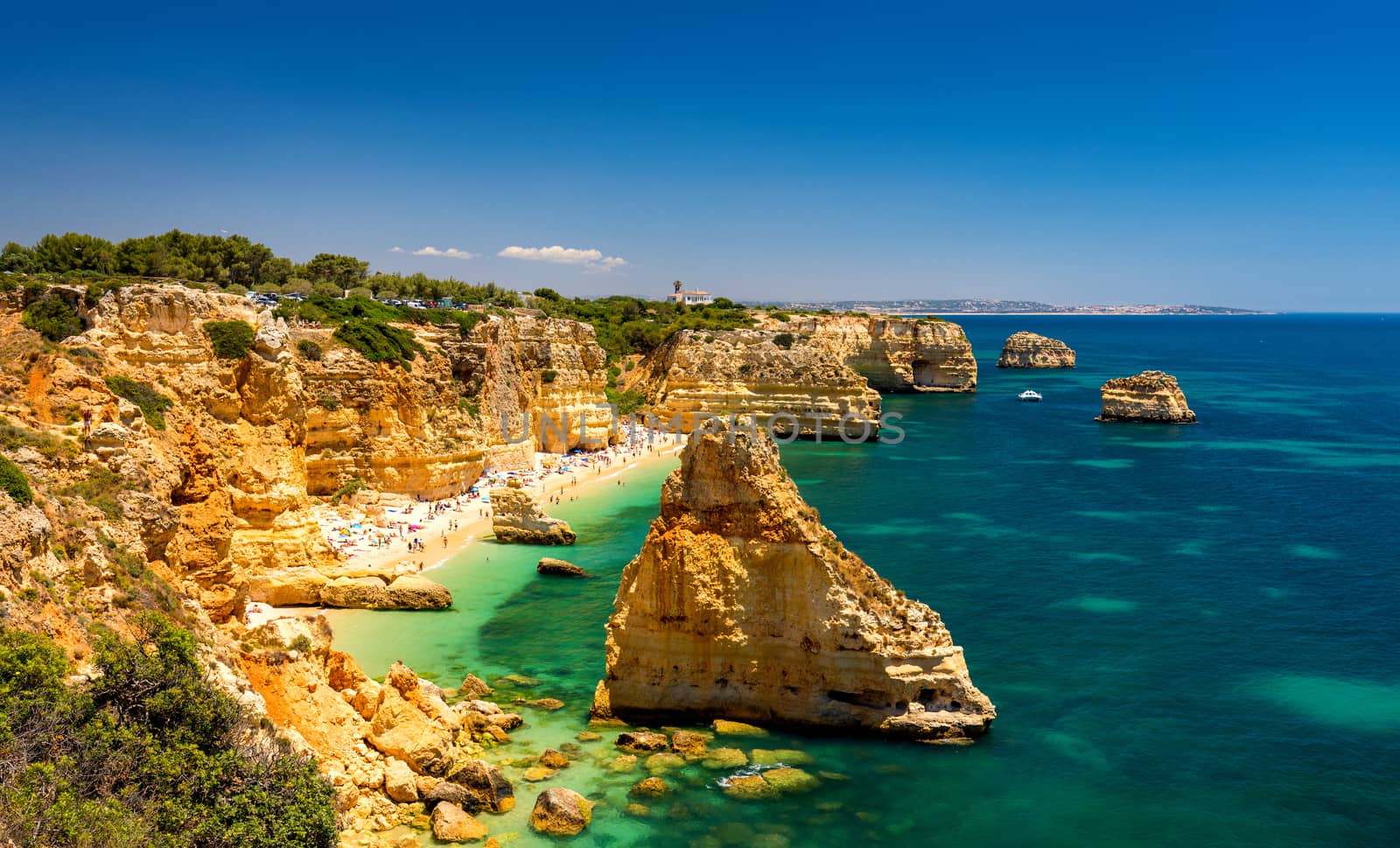 Praia da Marinha, beautiful beach Marinha in Algarve, Portugal. Navy Beach (Praia da Marinha), one of the most famous beaches of Portugal, located on the Atlantic coast in Lagoa Municipality, Algarve.