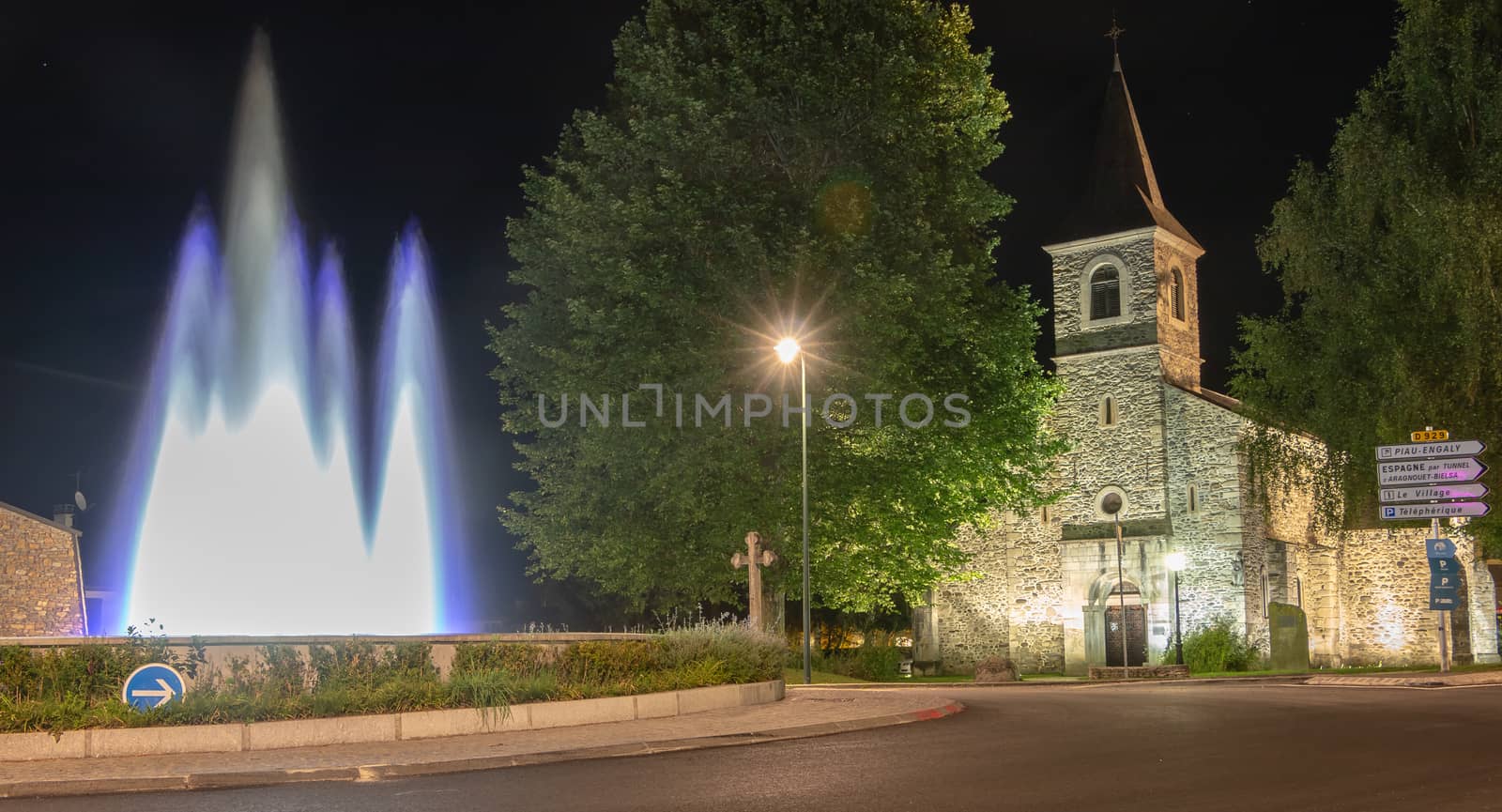Saint Lary Soulan, France - August 21, 2018: Architecture detail of the Sainte Marie chapel by night on a summer day