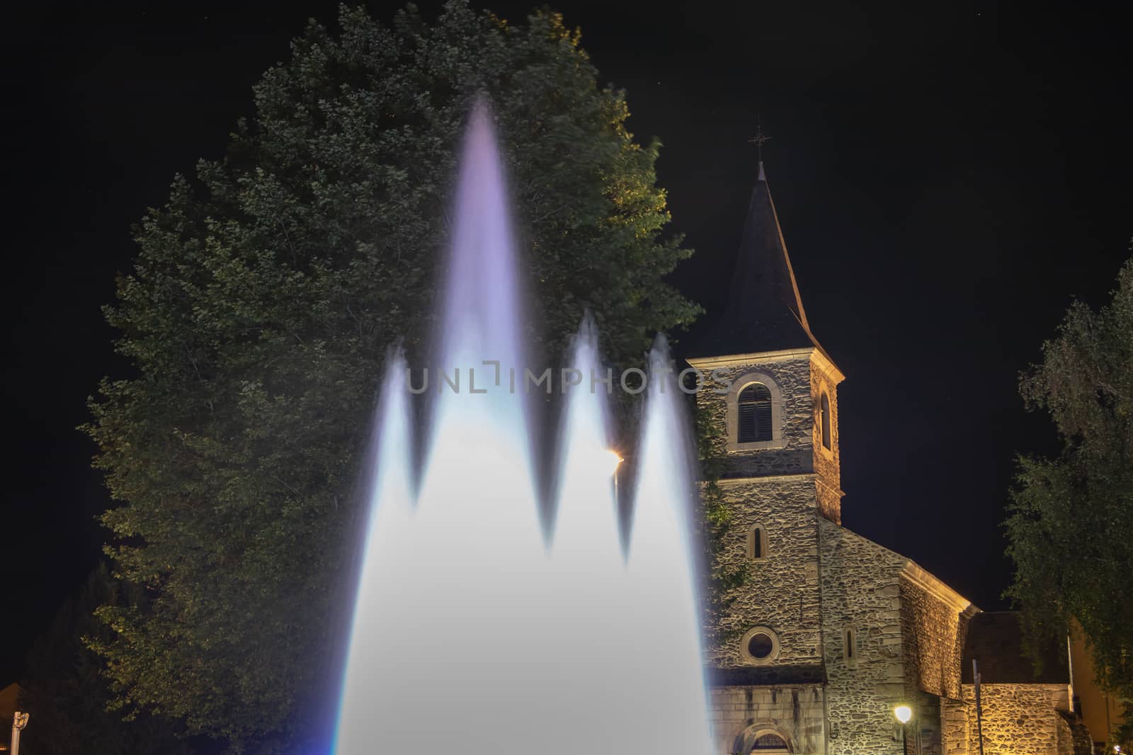 Saint Lary Soulan, France - August 21, 2018: Architecture detail of the Sainte Marie chapel by night on a summer day