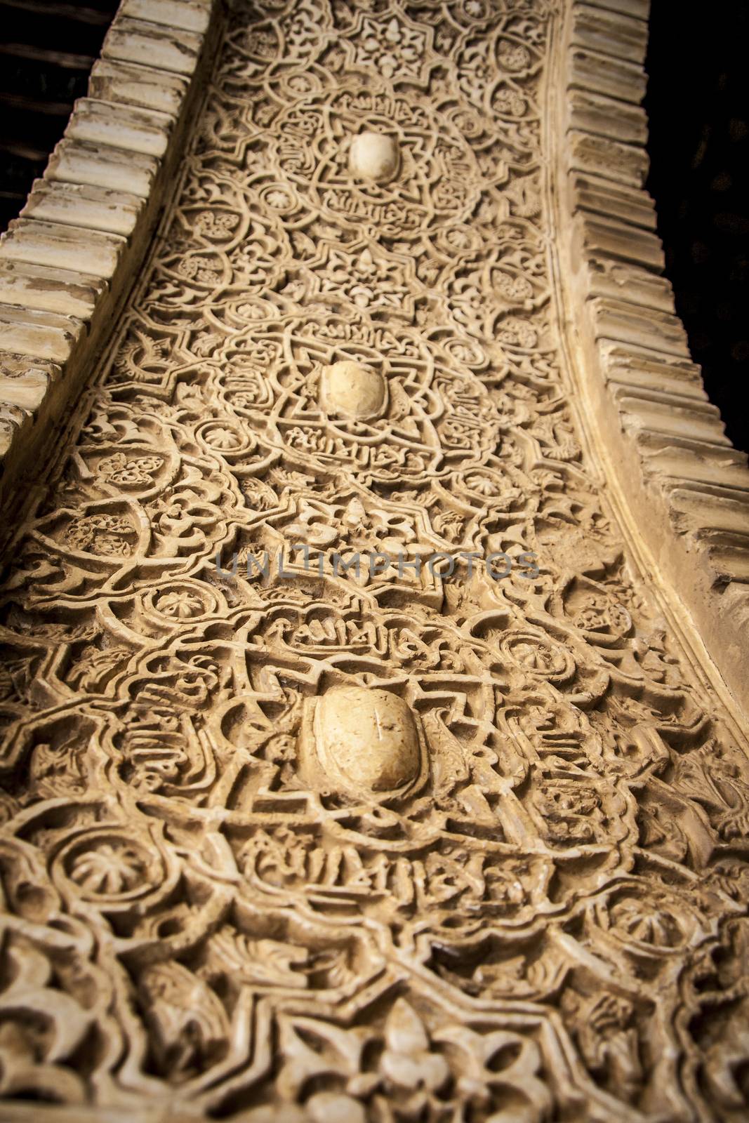Arabic decoration in plaster. Alhambra of Granada. Spain