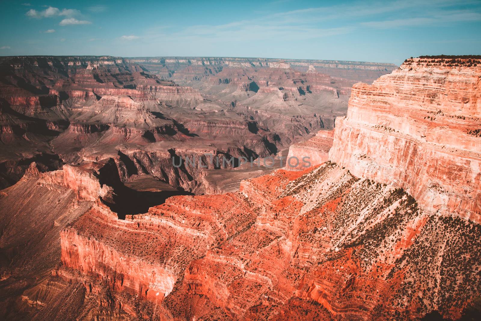 Colors and layers from the southern rim of Grand Canyon National Park.Teal and orange view. by tanaonte