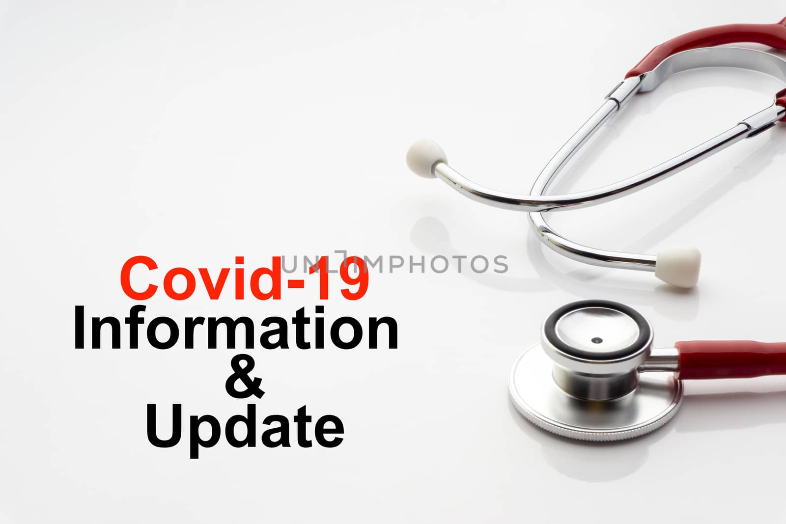 COVID-19 INFORMATION AND UPDATE text with stethoscope on white background. Covid or Coronavirus Concept 