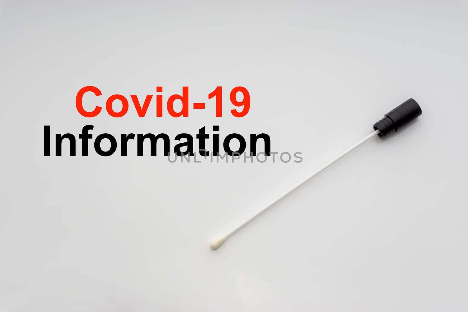 COVID-19 INFORMATION text with medical swab on white background by silverwings