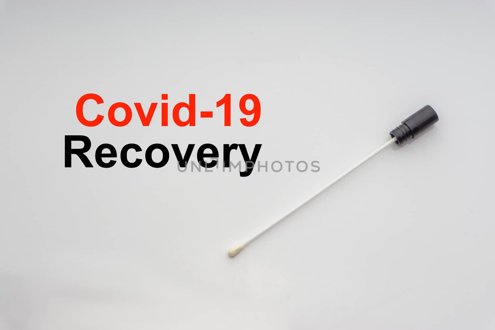 COVID-19 RECOVERY text with medical swab on white background by silverwings