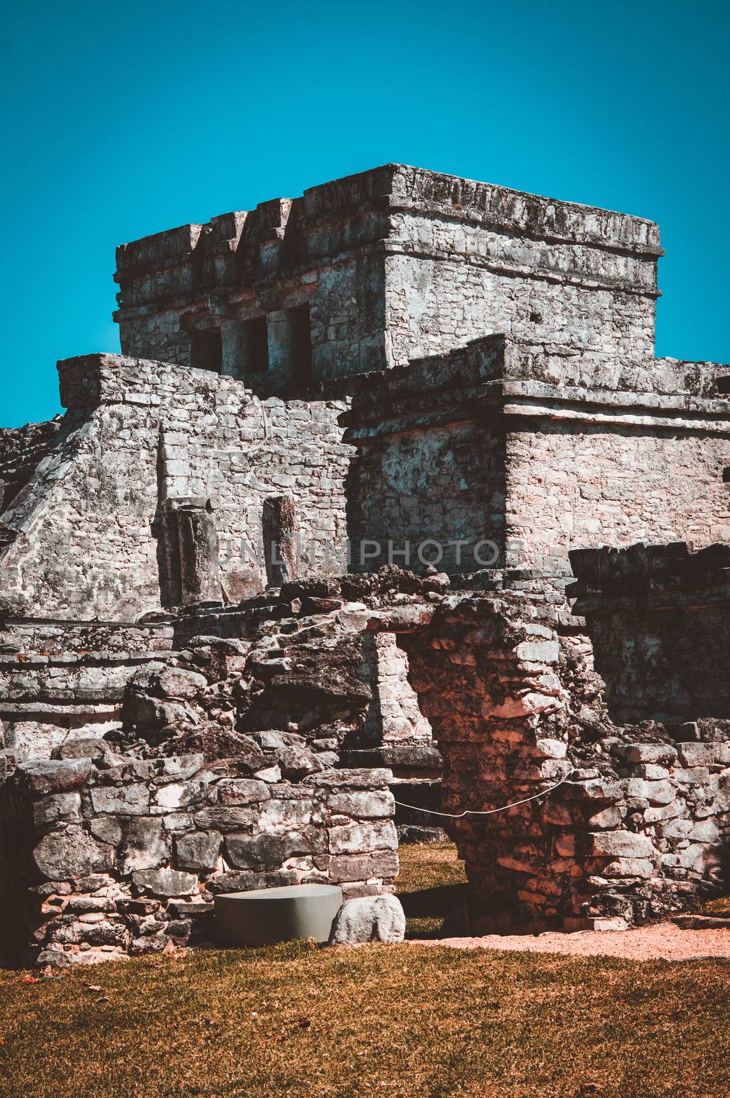 Mayan Temple of the Wind God in Tulum, Mexico by tanaonte
