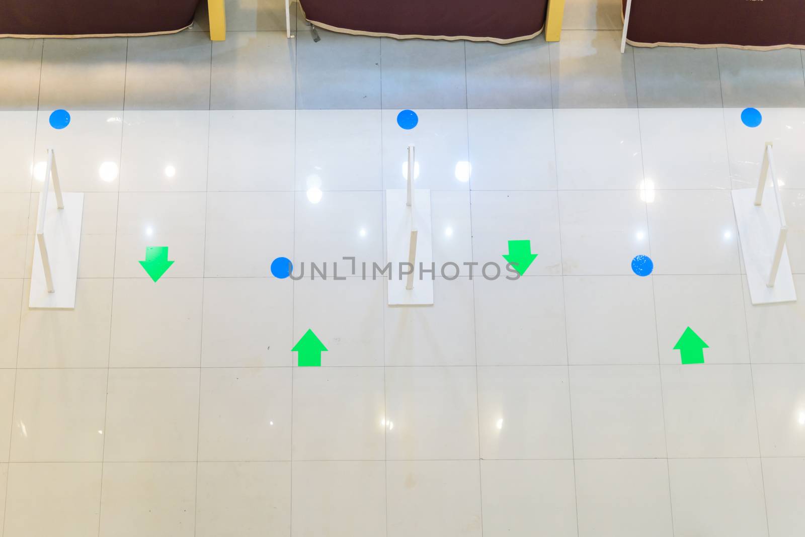 social distancing sign at the floor for shopping Queue by rukawajung