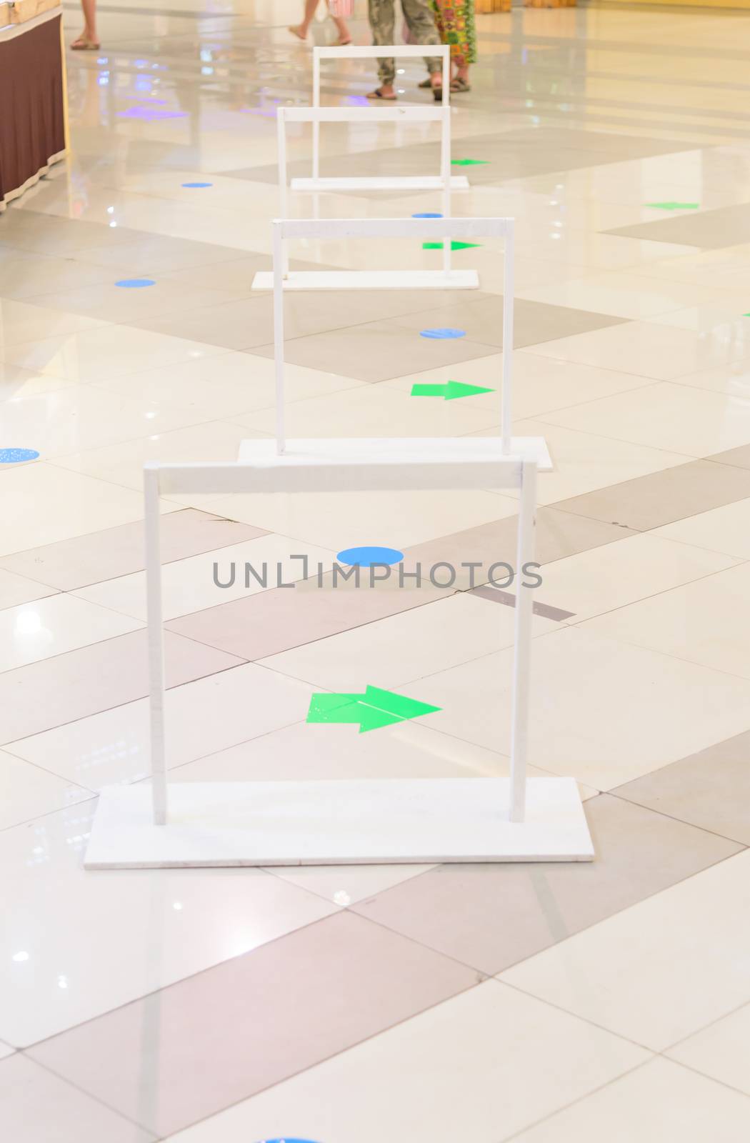 social distancing sign at the floor for shopping Queue