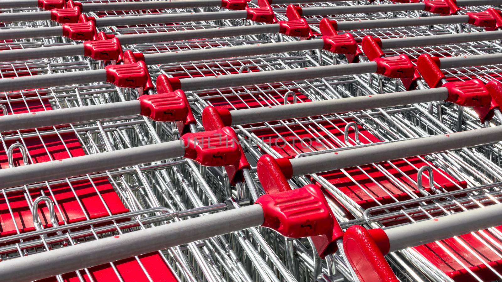 Row of red shopping cart at departmentstore