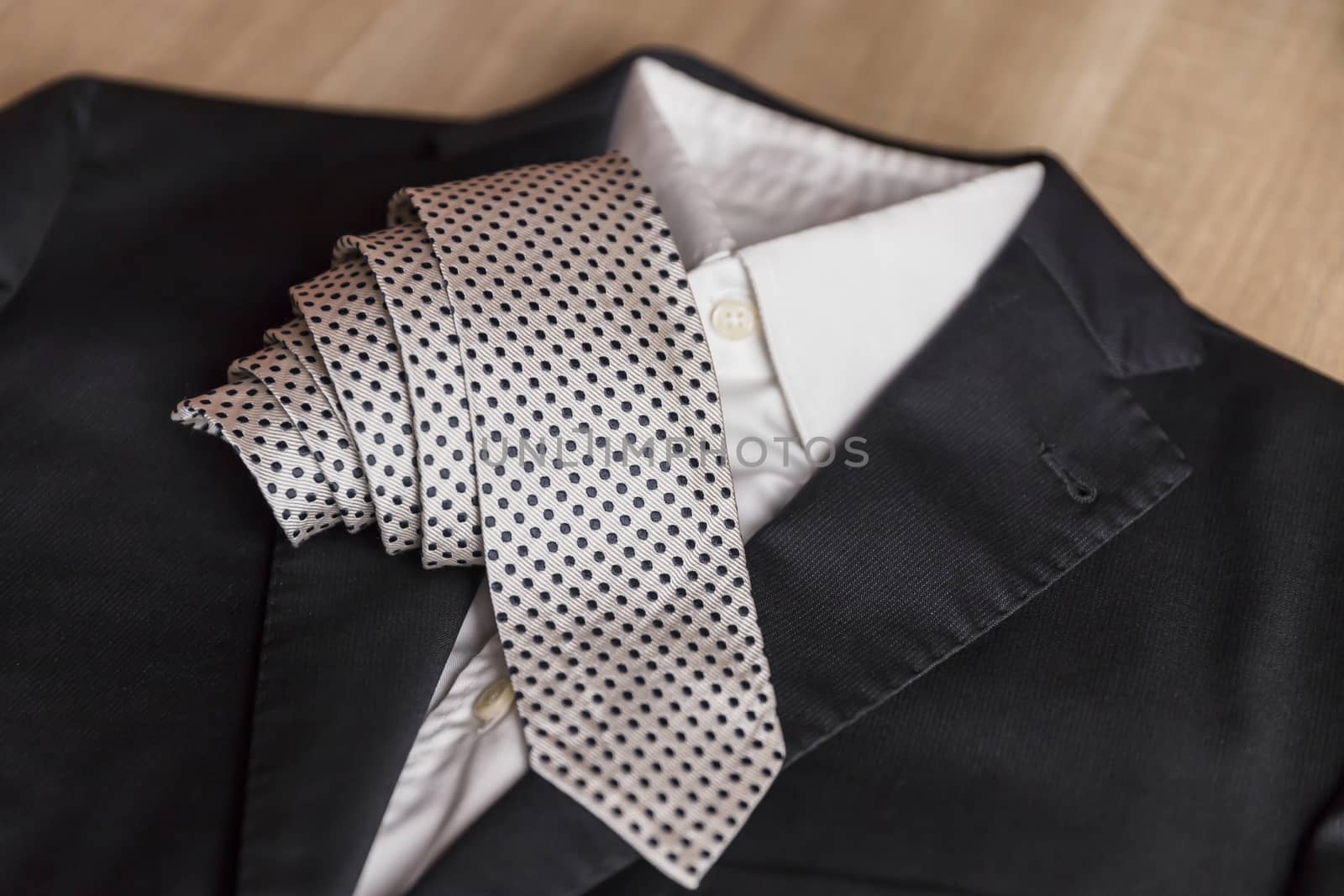 Jacket and tie detail by germanopoli