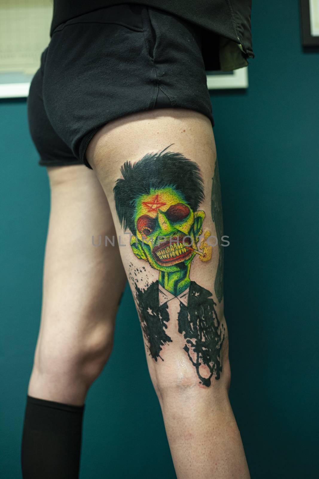Coloured Tattoo with green face painted 7 by pippocarlot