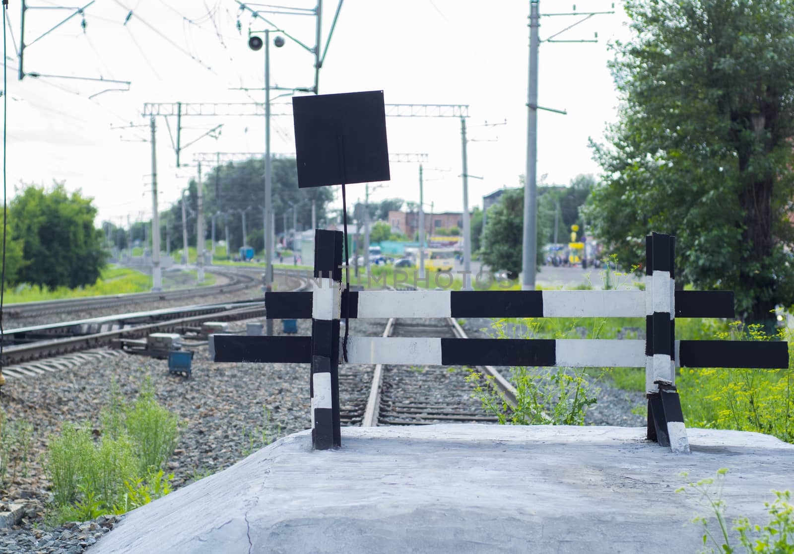 Railway impasse on the railroad tracks on the spring in Sunny weather