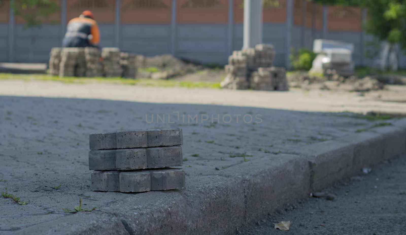 road worker resting on a background of border