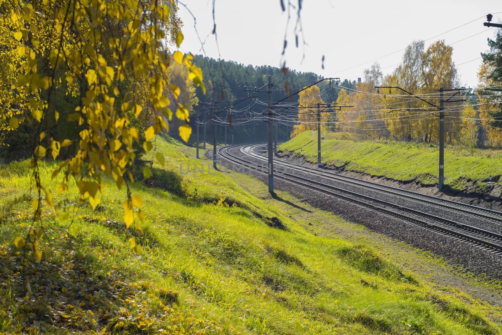 autumn railway in the valley of the hills