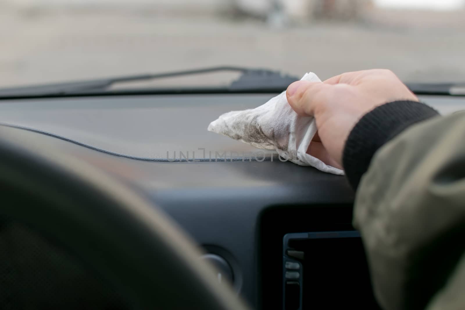 hand of people clean cloth car dashboard, of the car by jk3030