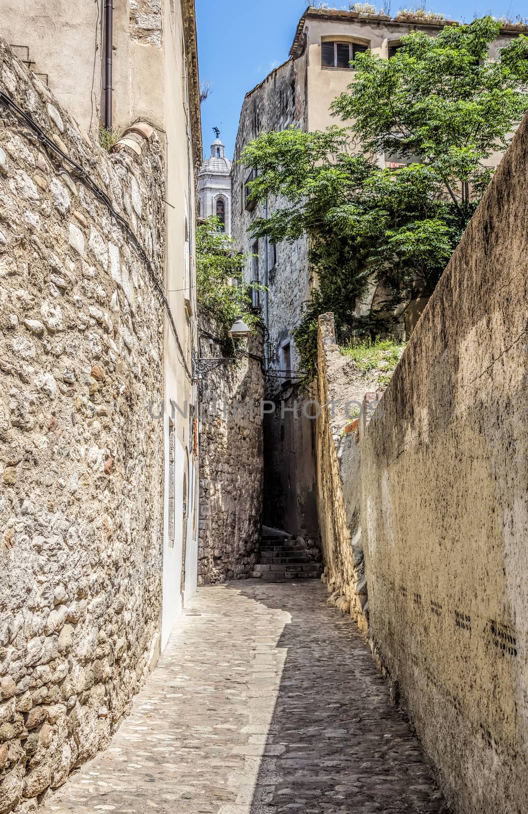 Ancient medieval narrow street in Girona. Spain. Catalonia.