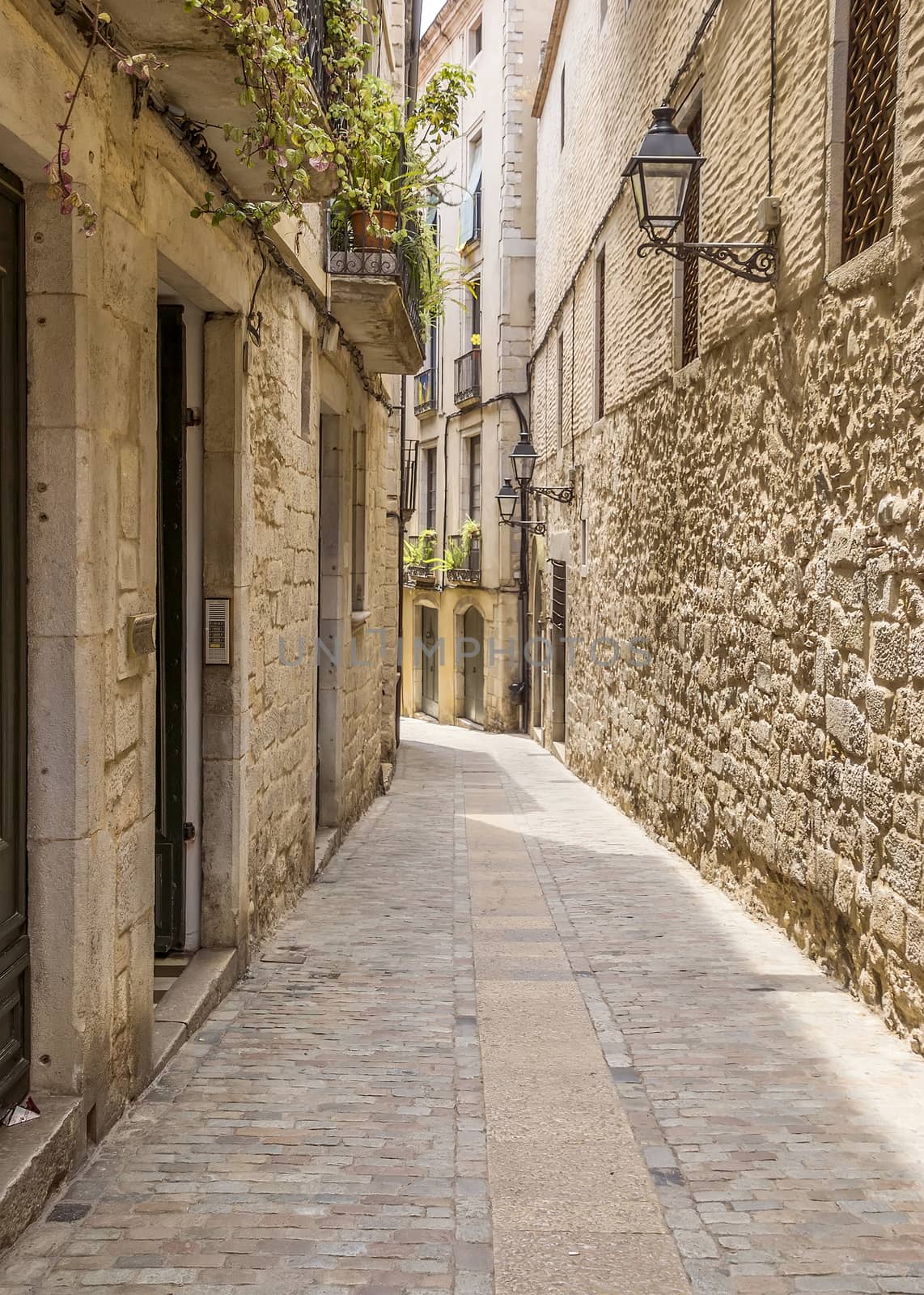 Ancient medieval narrow street in Girona. Spain. Catalonia.