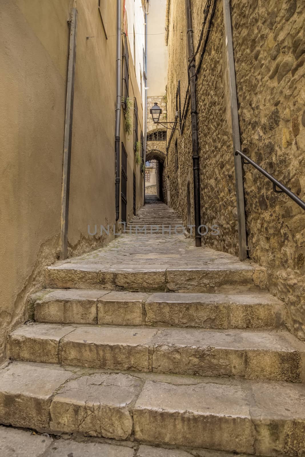 Ancient medieval narrow street in Girona. Spain. Catalonia.