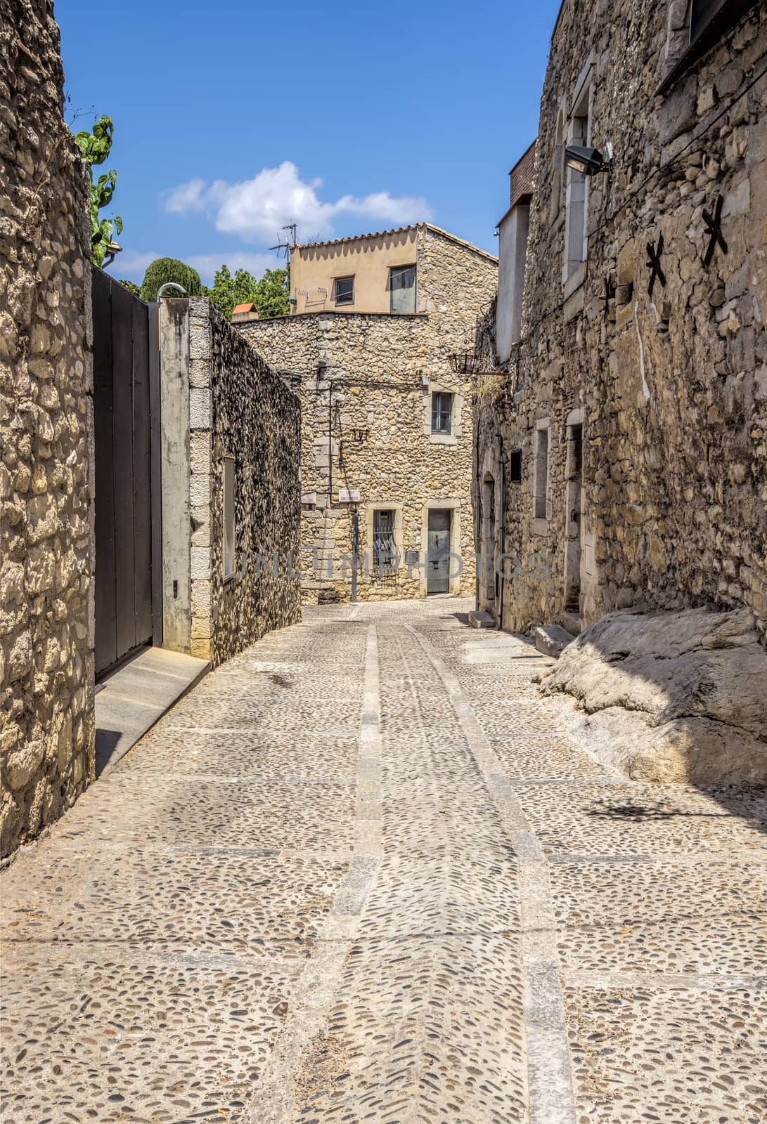 Ancient medieval narrow street in Girona. Spain. Catalonia.
