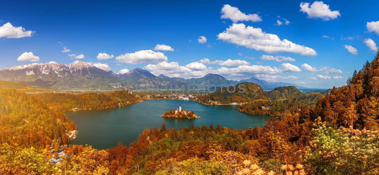 Autumn view on Bled Lake with Pilgrimage Church of the Assumptio by DaLiu