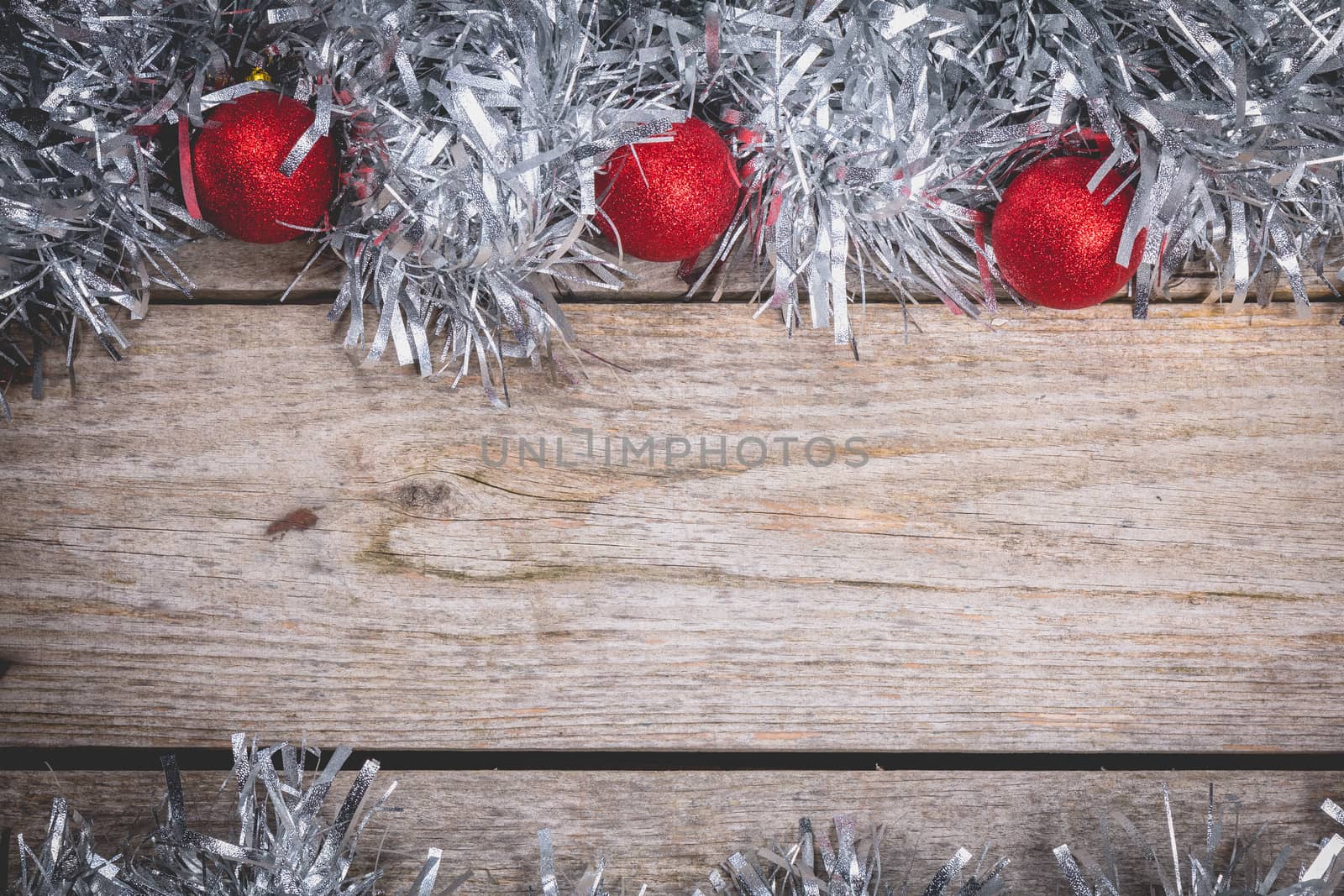 merry christmas concept with grey decoration on old wooden board