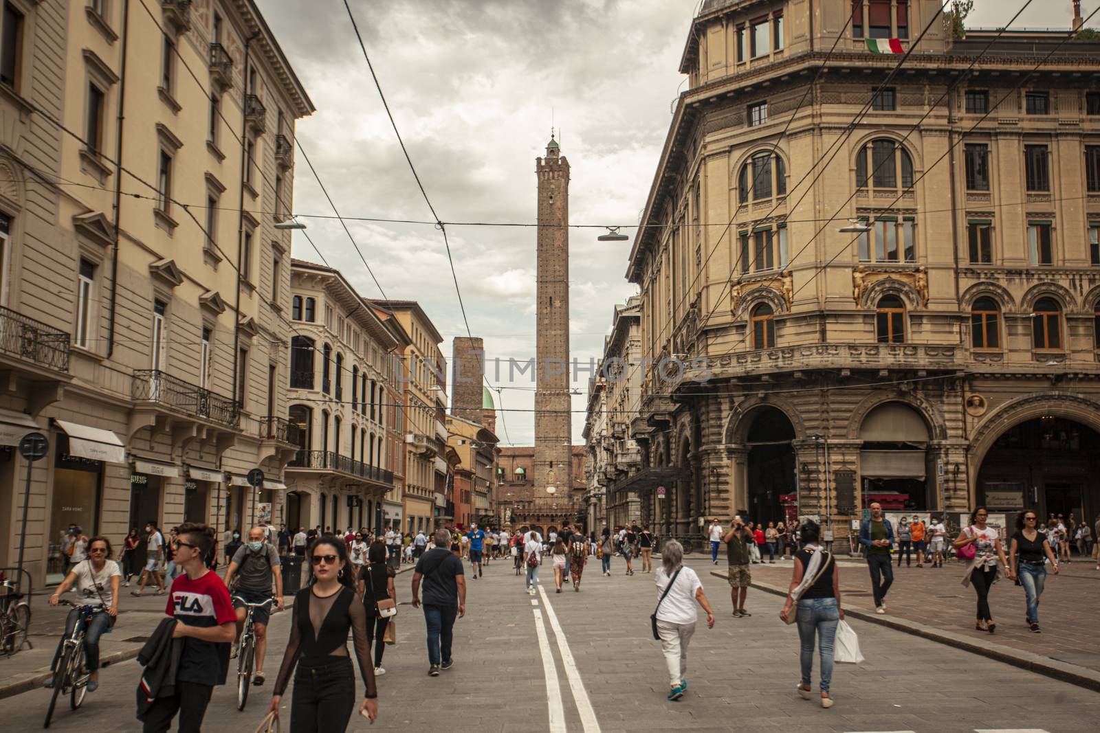 BOLOGNA, ITALY 17 JUNE 2020: Via Rizzoli in Bologna, Italy with his historical Building and the Asinelli Tower at the end