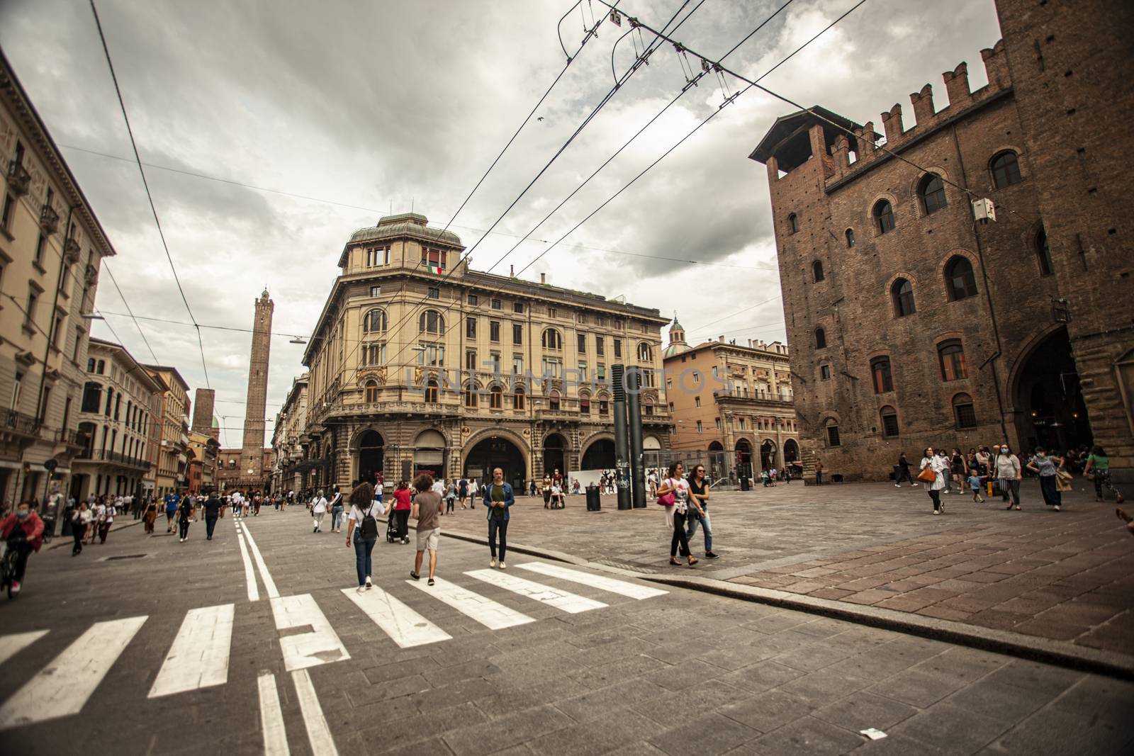 BOLOGNA, ITALY 17 JUNE 2020: Via Rizzoli in Bologna, Italy with his historical Building and the Asinelli Tower at the end