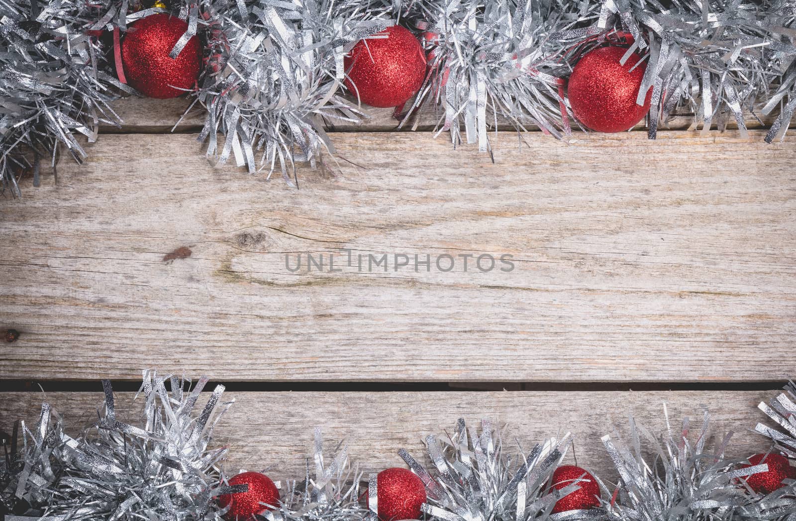 merry christmas concept with grey decoration on old wooden board