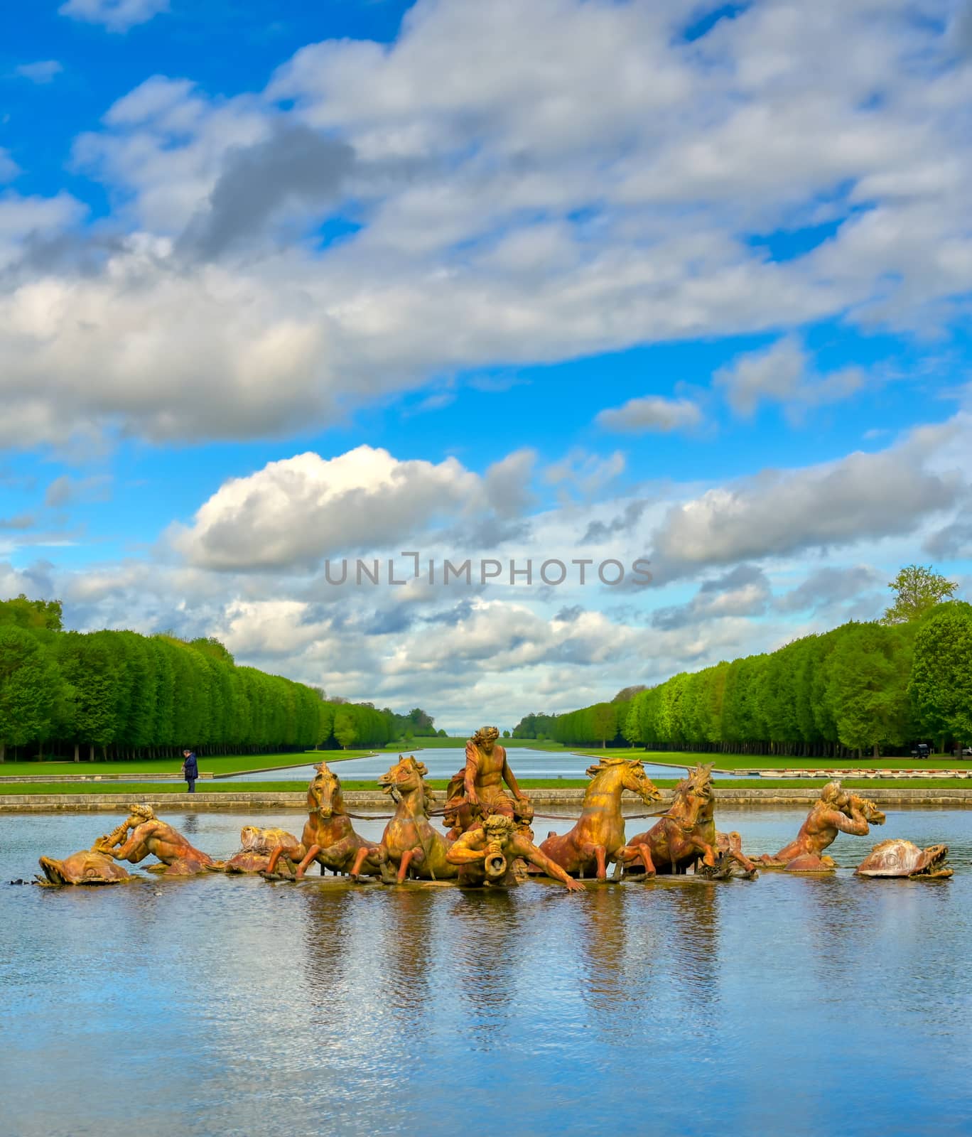 Versailles, France - April 24, 2019: Fountain of Apollo in the garden of Versailles Palace on a sunny day outside of Paris, France.