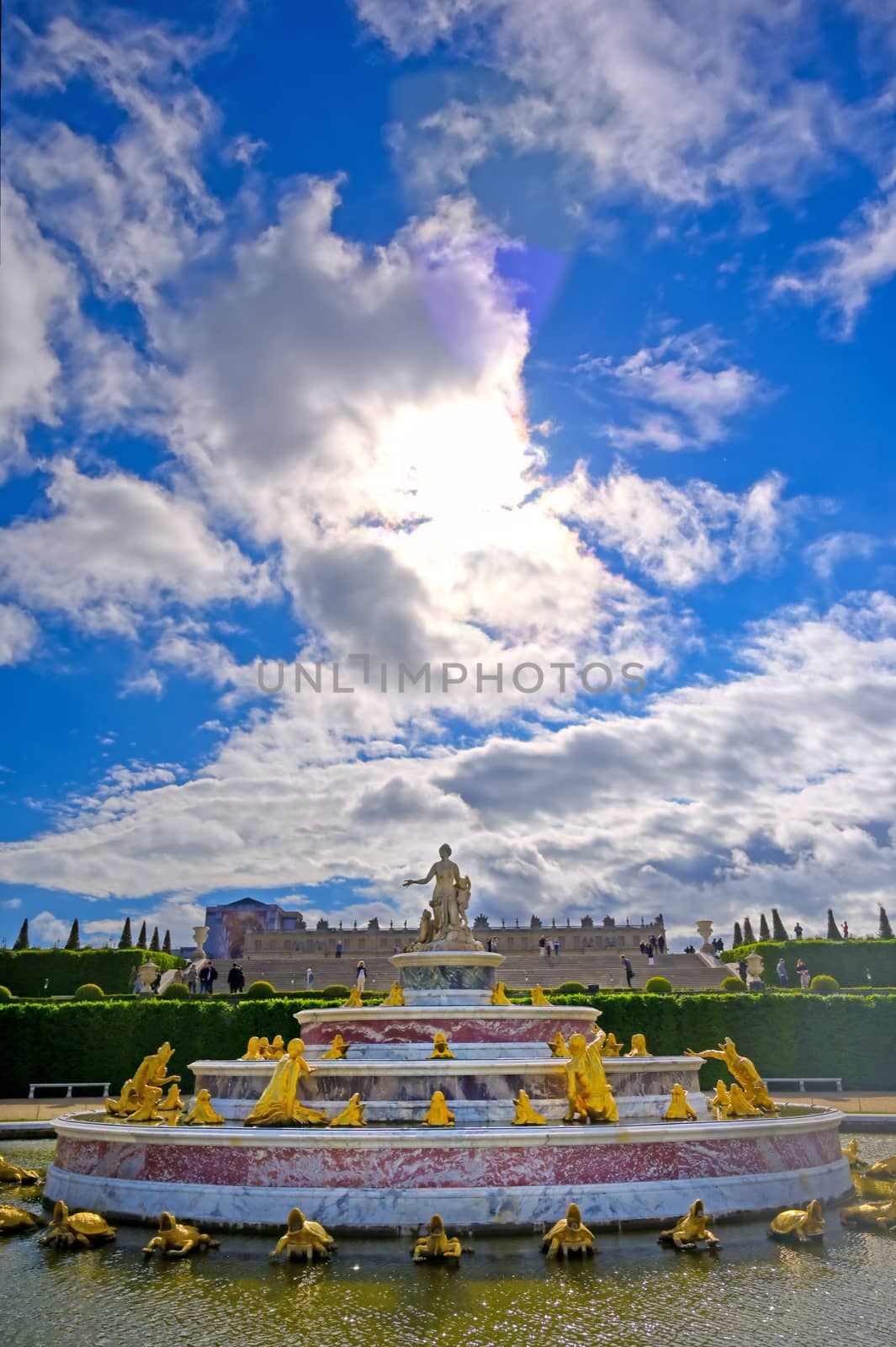 Versailles, France - April 24, 2019: Fountain of Latona in the garden of Versailles Palace on a sunny day outside of Paris, France.