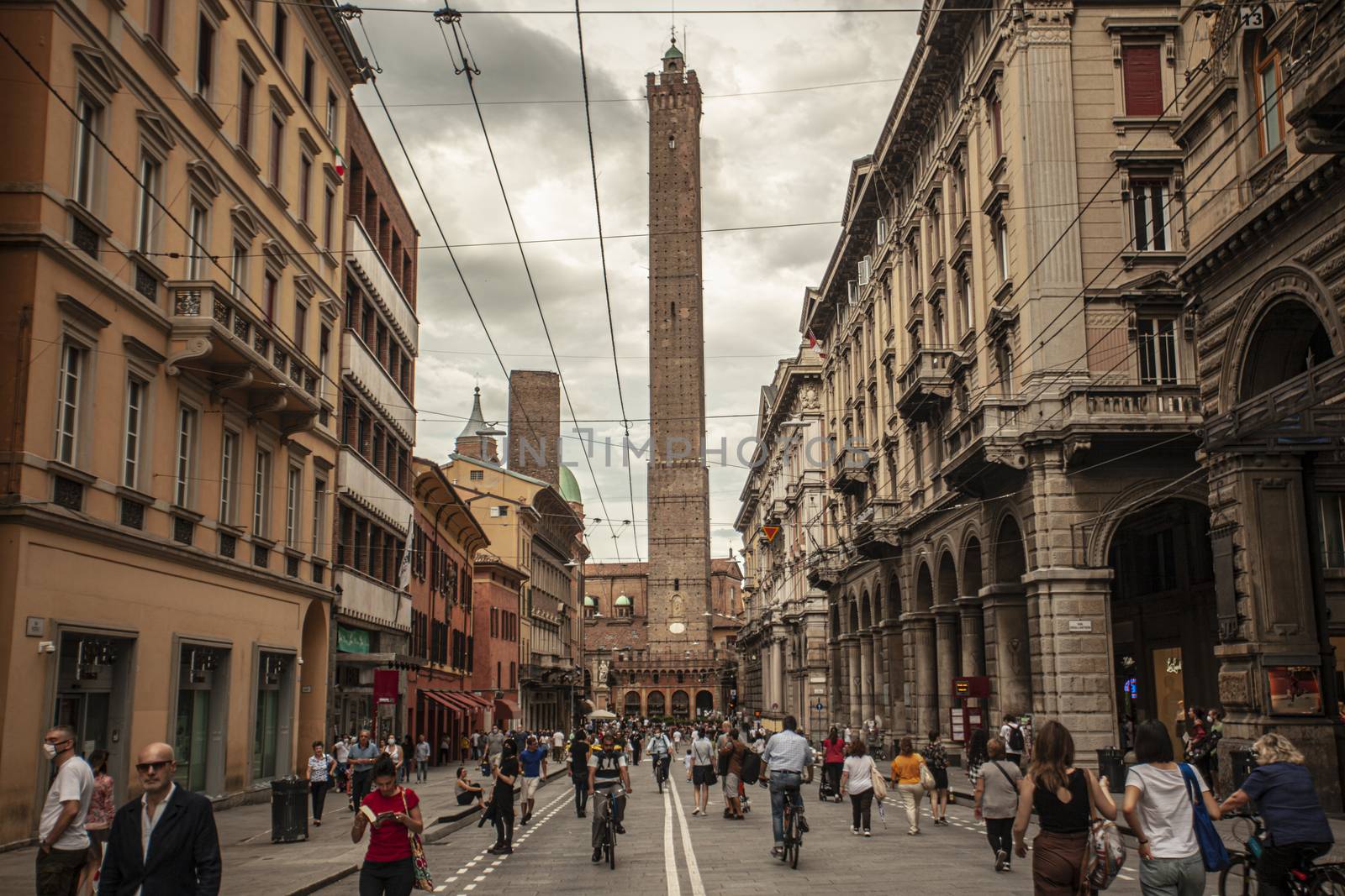 BOLOGNA, ITALY 17 JUNE 2020: Via Rizzoli in Bologna, Italy with his historical Building and the Asinelli Tower at the end