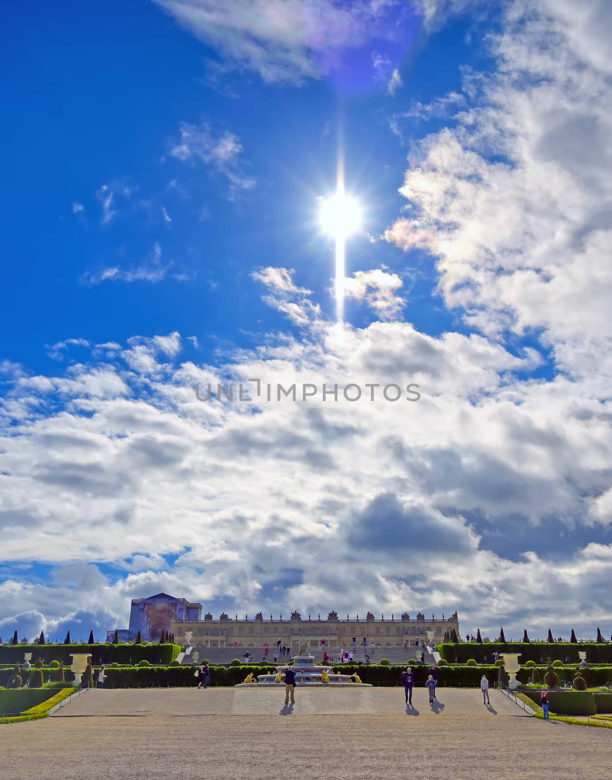 Versailles, France - April 24, 2019: The statues and fountains in and around the garden of Versailles Palace on a sunny day outside of Paris, France.