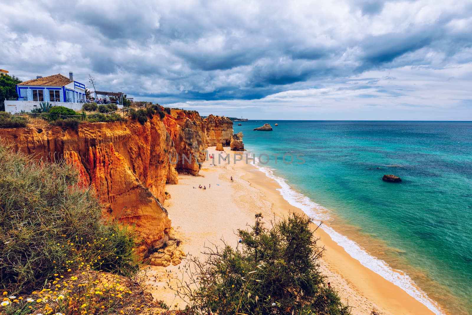 Praia dos Tres Castelos in south Portugal, Portimao, Algarve region. Landscape with Atlantic Ocean, shore and rocks in Tres Castelos beach (Praia dos Tres Castelos), Algarve, Portimao, Portugal.