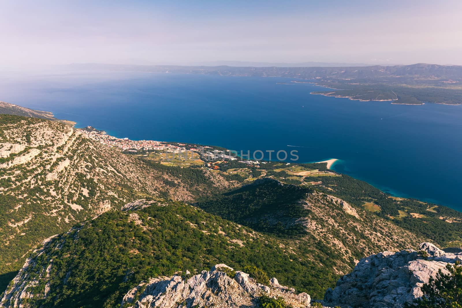 Bol on Brac island panoramic aerial view, Dalmatia, Croatia. Town of Bol from Vidova Gora aerial view, Island of Brac, Dalmatia, Croatia.