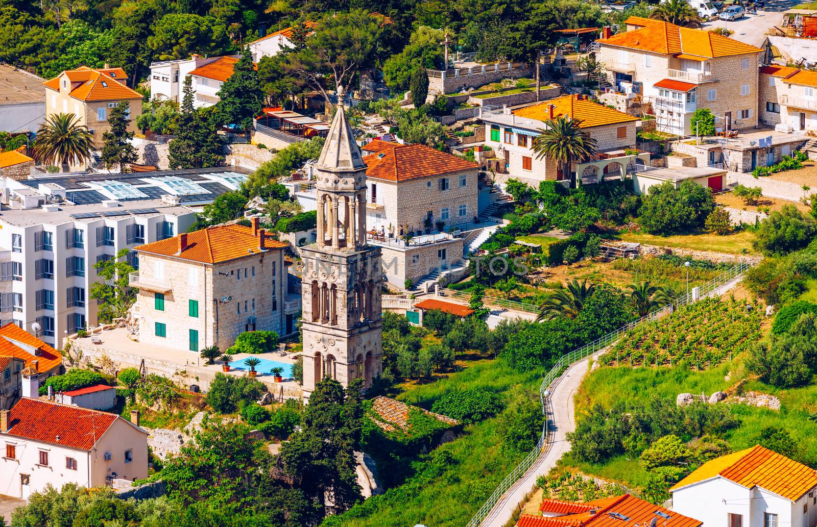 Amazing historic town of Hvar aerial view, Dalmatia, Croatia. Island of Hvar bay aerial view, Dalmatia, Croatia. Harbor of old Adriatic island town Hvar. Popular touristic destination of Croatia.