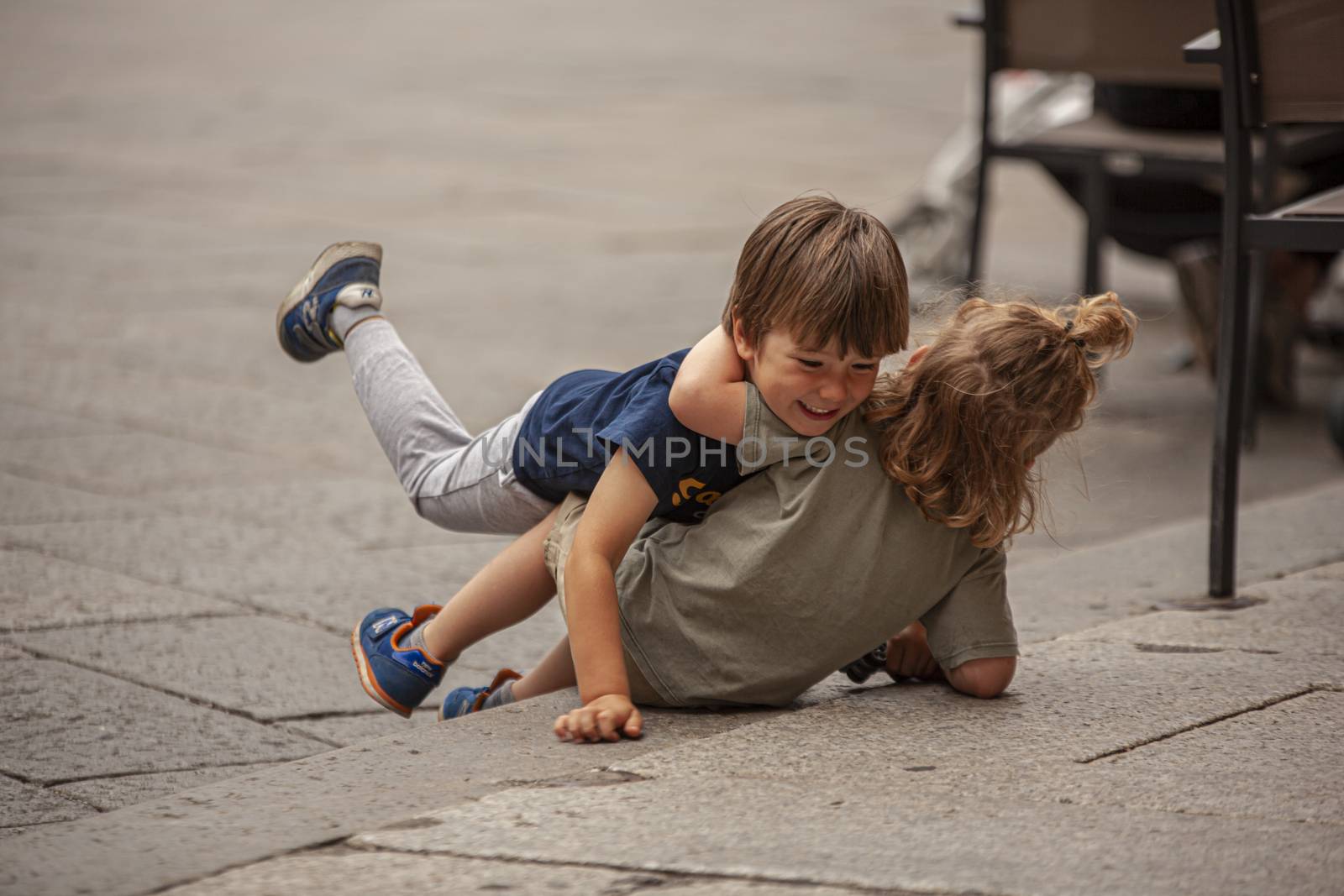 Children play on the street 2 by pippocarlot