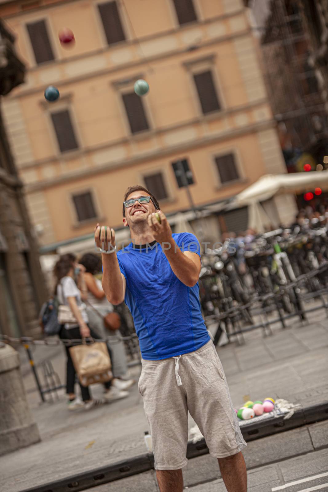 BOLOGNA, ITALY 17 JUNE 2020: Street artist juggler in Bologna, Italy