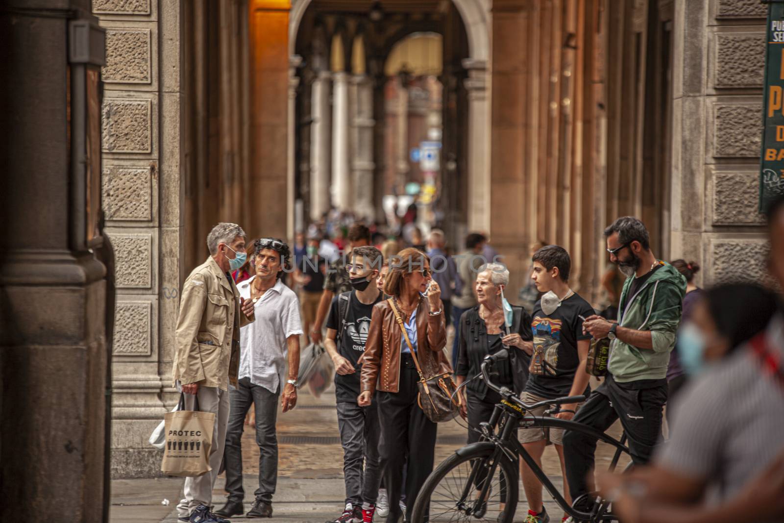People walking under arcades in Bologna, Italy 4 by pippocarlot