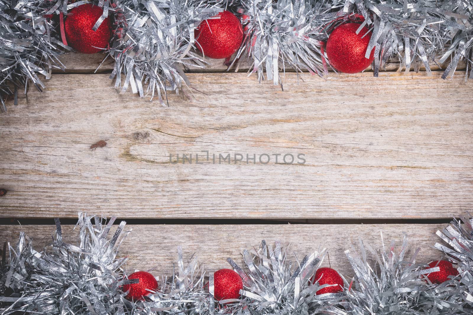 merry christmas concept with grey decoration on old wooden board