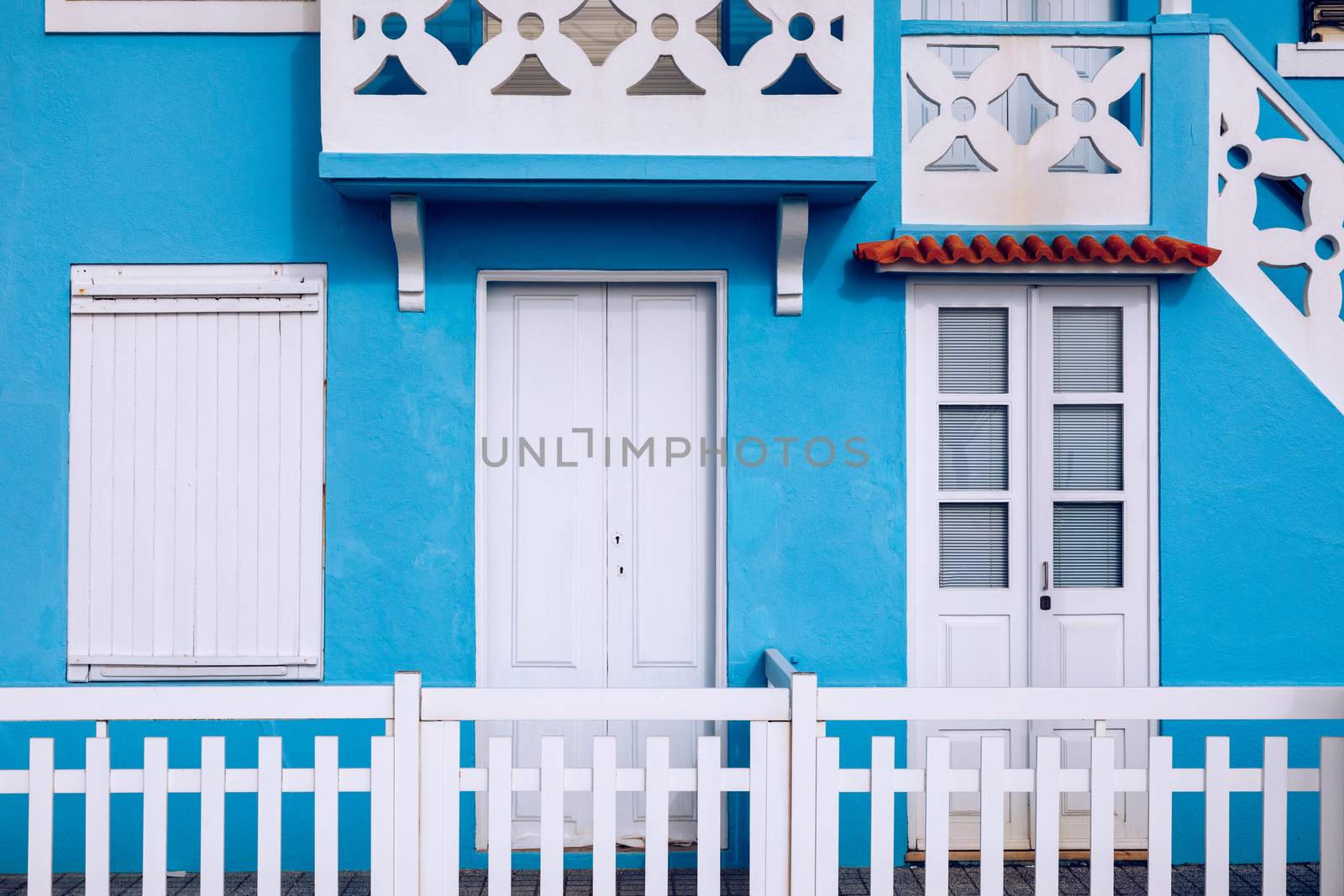 Colored Windows of "Costa Nova do Prado", Portugal. Windows in typical small wooden house with colorful stripes in Costa Nova. Aveiro. Portugal. Detail of the house in famous resort Costa Nova.