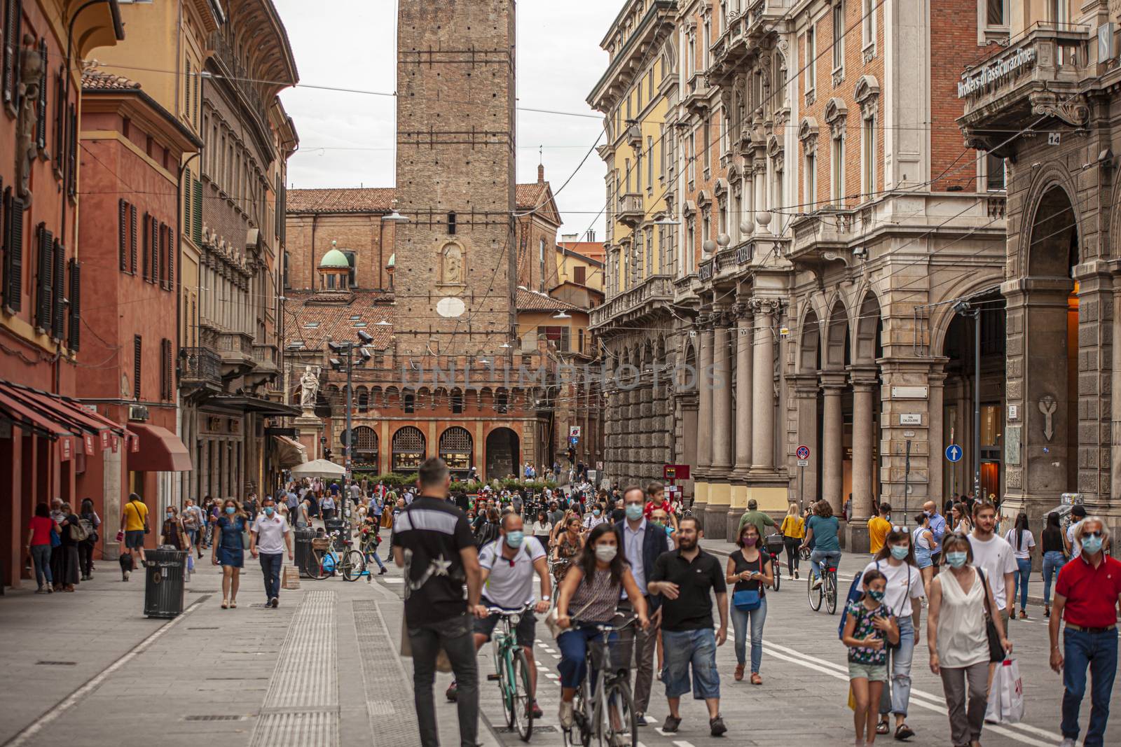 BOLOGNA, ITALY 17 JUNE 2020: People in Bologna walking on city center