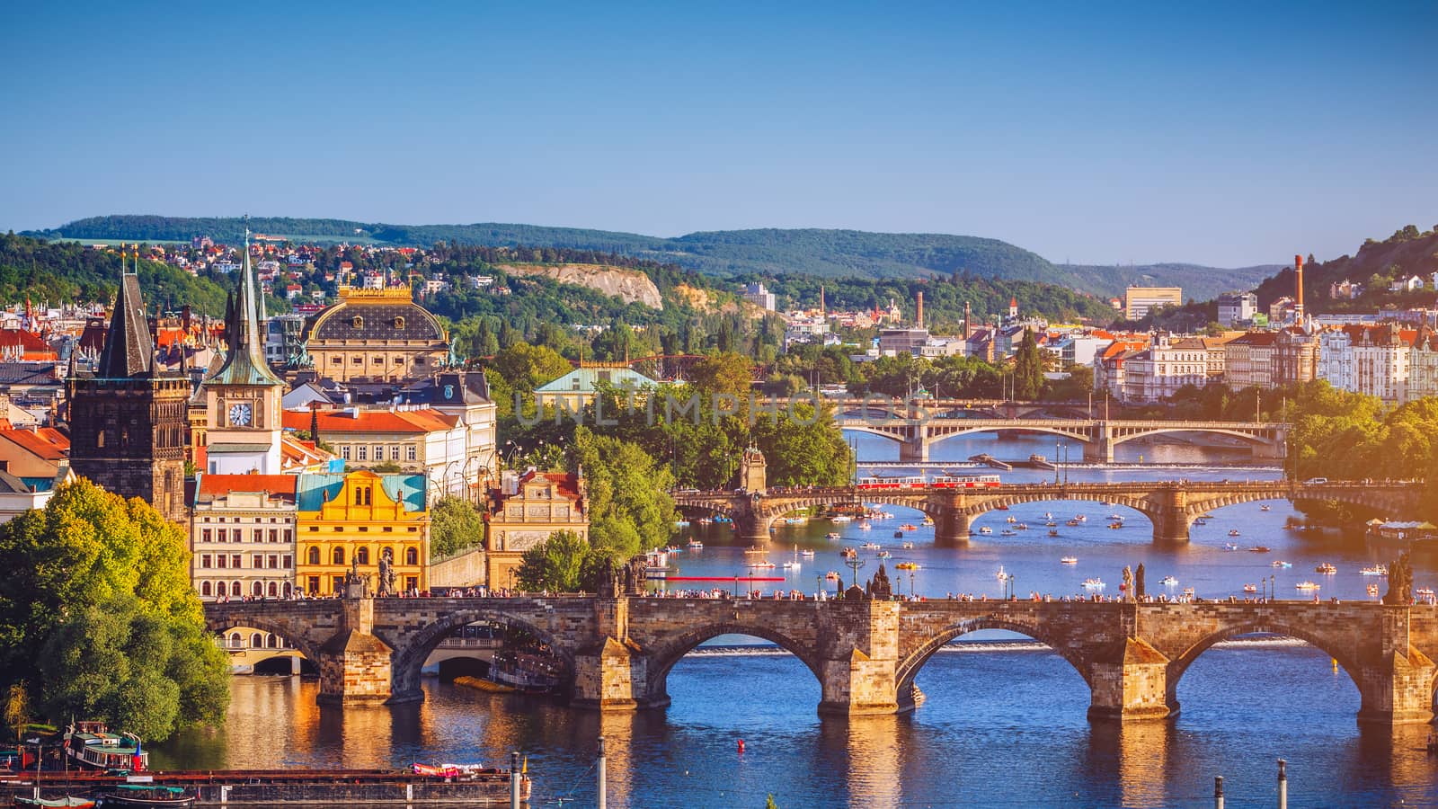 Prague Scenic spring sunset aerial view of the Old Town pier architecture and Charles Bridge over Vltava river in Prague, Czech Republic